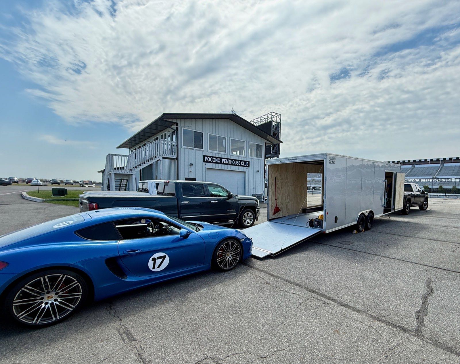 Unloading the Cayman GTS from the trailer at the Pocono Penthouse Club