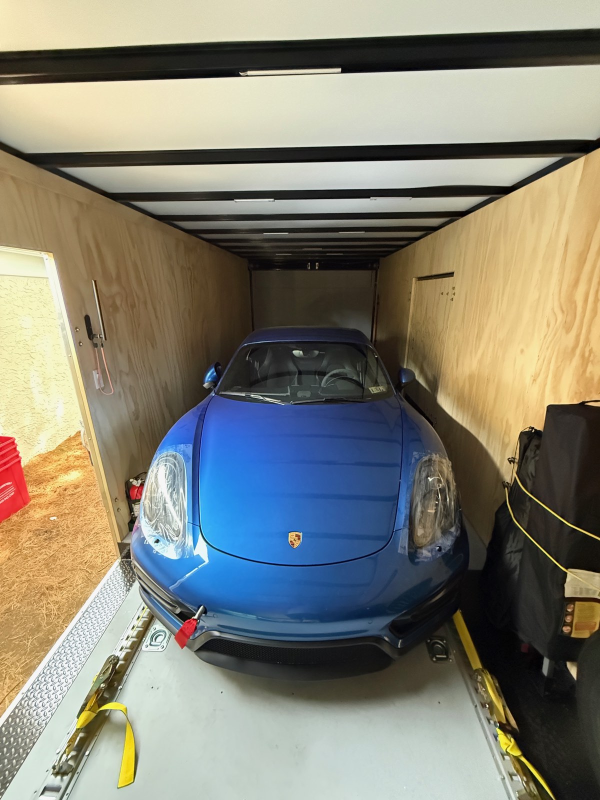 The Cayman GTS strapped down inside the GrahamStone trailer